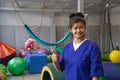 Woman physiotherapist in rehabilitation center in sensory room