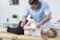 Woman on physiotherapy table Royalty Free Stock Photo