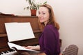 Woman and piano at old school Royalty Free Stock Photo