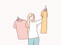 Woman pick her fashion outfit after the shopping simple korean style illustration