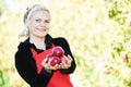 Woman picker portrait in apples orchard Royalty Free Stock Photo