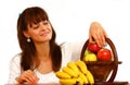 Woman picking fruit (fruits). Royalty Free Stock Photo