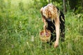 Woman picking herbal tea