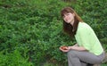 A woman picking strawberries Royalty Free Stock Photo