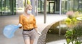 woman picking up plastic household waste in park Royalty Free Stock Photo