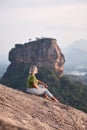 Woman on Pidurangala Rock with View on Sigiriya Royalty Free Stock Photo