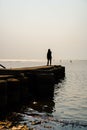 the woman on the pier looks beautiful Royalty Free Stock Photo