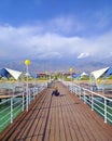 Woman, pier, mountains, island