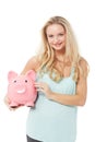 Woman, piggy bank and finance or happy in studio with cash investment, financial growth or portrait. Person, money box Royalty Free Stock Photo