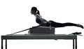 Woman pilates reformer exercises fitness isolated Royalty Free Stock Photo