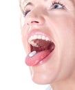 Woman with pill in her mouth Royalty Free Stock Photo