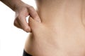 Woman pinches her fat Royalty Free Stock Photo