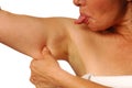 Woman pinching underarm