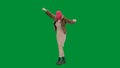 Woman in pink balaclava, tiger fur coat and evening dress walking and dancing merrily with her hands up. Woman freak on Royalty Free Stock Photo