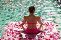 Woman in Pink Bikini Sitting in Pool Royalty Free Stock Photo