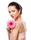 Woman with pink gerber flower isolated on white Royalty Free Stock Photo