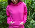 Woman in pink hoodie