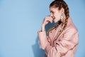 woman in pink jacket pigtails decoration fashion glamor modern style