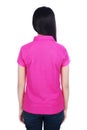 Woman in pink polo shirt isolated on a white background Royalty Free Stock Photo