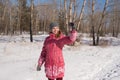 Woman in pink taking selfie