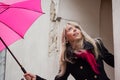 Woman with pink umbrella Royalty Free Stock Photo