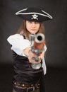 Woman - pirate aims in us from an ancient pistol
