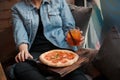 Woman with Pizza and cocktail