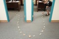 Woman placing trail of bread