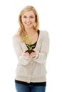 Woman with plant and dirt in hand