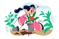 Woman is planting home plant in pot, taking care blooms and dusting petals to improve growth flower