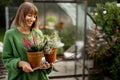 Woman with plants at backyard Royalty Free Stock Photo