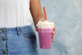 Woman with plastic cup of tasty milk shake Royalty Free Stock Photo