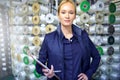 Woman, plastic and product manufacturing with warehouse, industry and portrait for storage. Industrial inspector Royalty Free Stock Photo