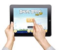 Woman play in the game Angry Birds