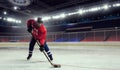 Woman play hockey . Mixed media Royalty Free Stock Photo