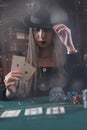 Woman play poker and showing two ace in game. Winner concept
