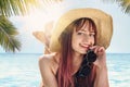 Woman play with sunglasses. Summer exotic vacation Maldive holiday background. happy young pretty Caucasian girl take Royalty Free Stock Photo