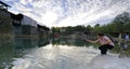 Woman play water in caihongqiao park, adobe rgb