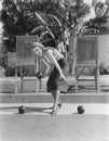 Woman playing bocce outdoors Royalty Free Stock Photo