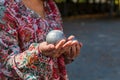 Woman playing boules in a park in Limoges