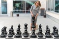 Woman playing chess game. Royalty Free Stock Photo