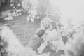 Woman playing with children in summer garden Royalty Free Stock Photo