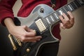 Woman Playing Electric Guitar Royalty Free Stock Photo