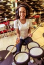 Woman playing electronic drums