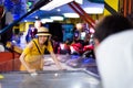 Woman playing games at arcade center