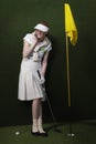 Woman Playing Golf While Using Cell Phone Royalty Free Stock Photo