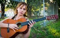 Woman playing guitar Royalty Free Stock Photo