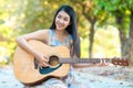 Woman playing guitar Royalty Free Stock Photo