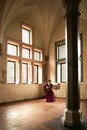 Woman playing guitar in Malbork Castle. Royalty Free Stock Photo