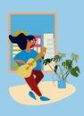 Woman playing guitar by the window. At-home concert. Creative activitiy. Social distancing during COVID-19 pandemic Royalty Free Stock Photo